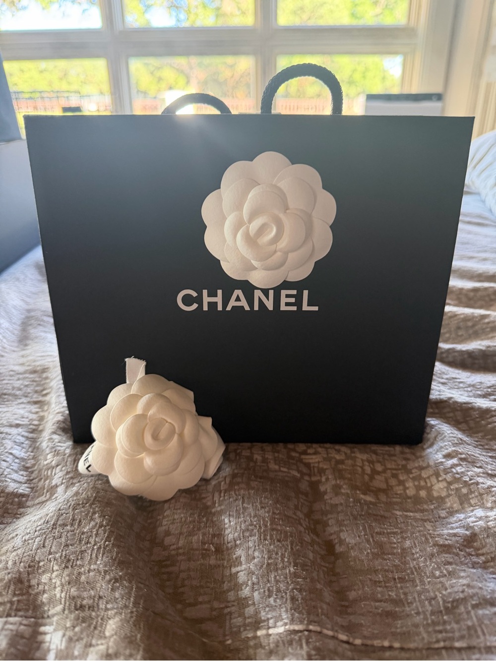 CHANEL Black Shopping Bag with White Camellia Motif